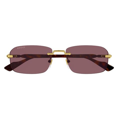 gucci gg1221s 002|Rectangular frame sunglasses in gold.